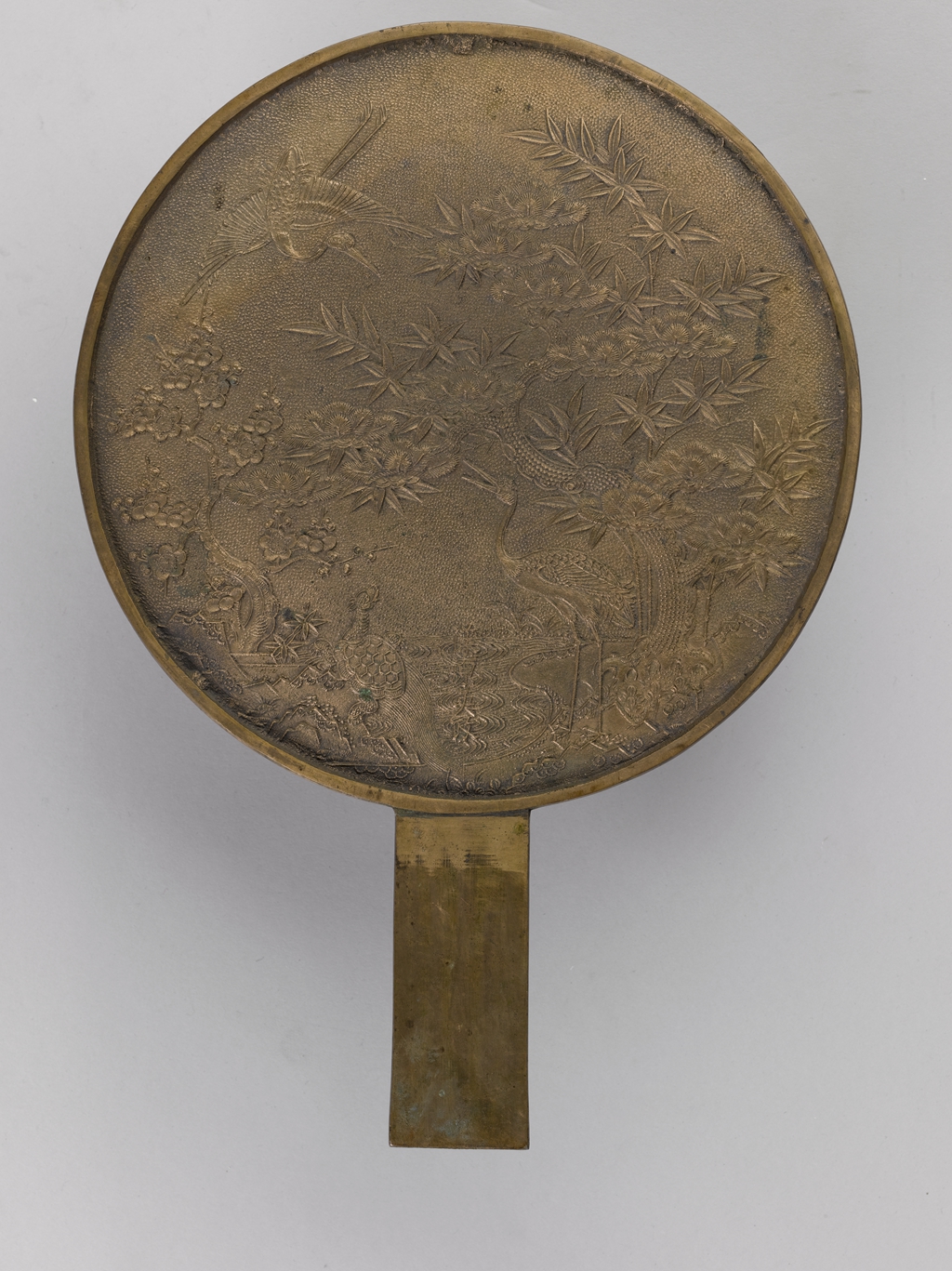 蓬莱纹柄镜(二十一)     藏品信息 藏品类型:青铜器 质地:铜质 尺寸