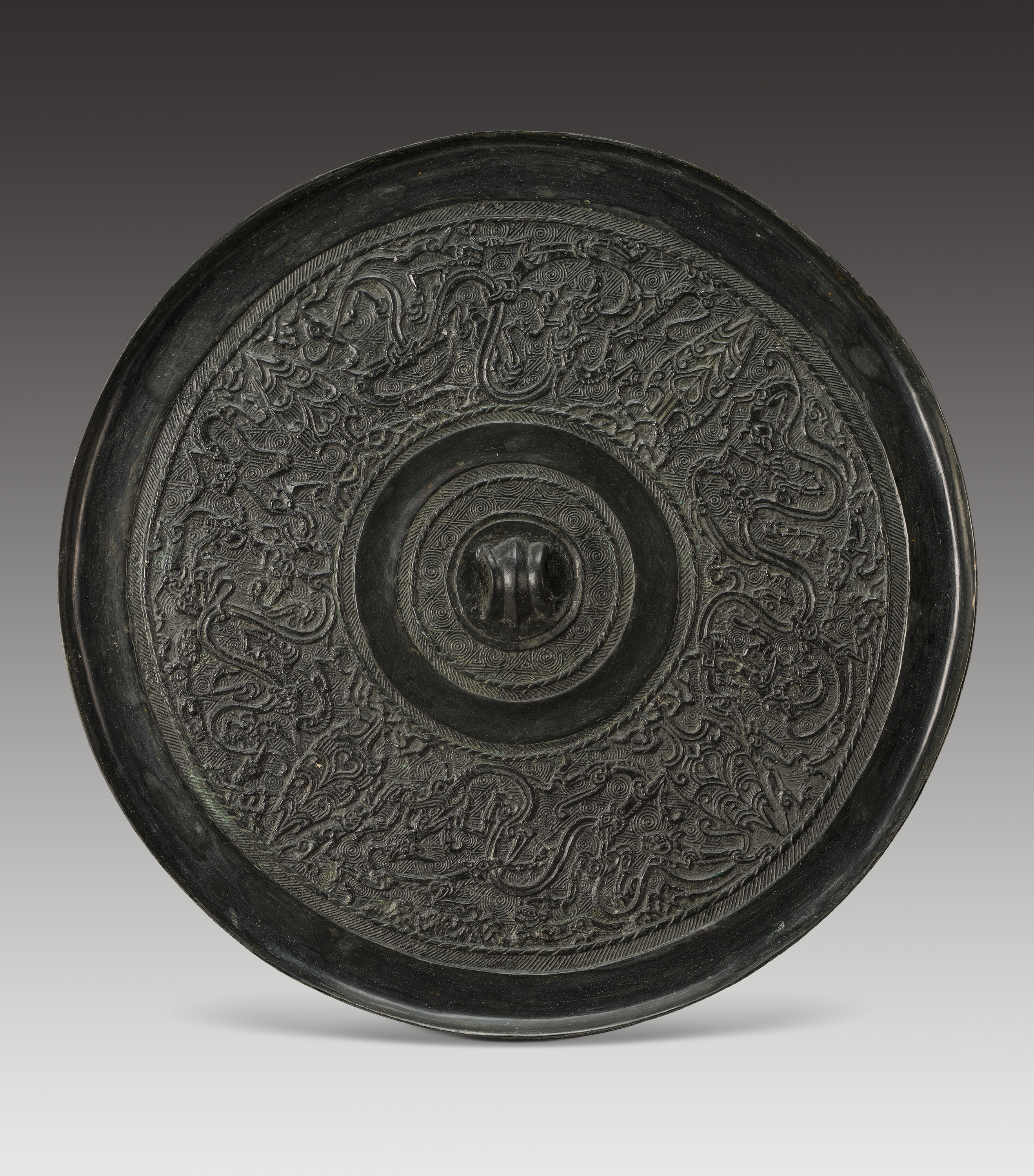 二十四龙四叶镜     藏品信息 藏品类型:青铜器 质地:铜质 尺寸:18.